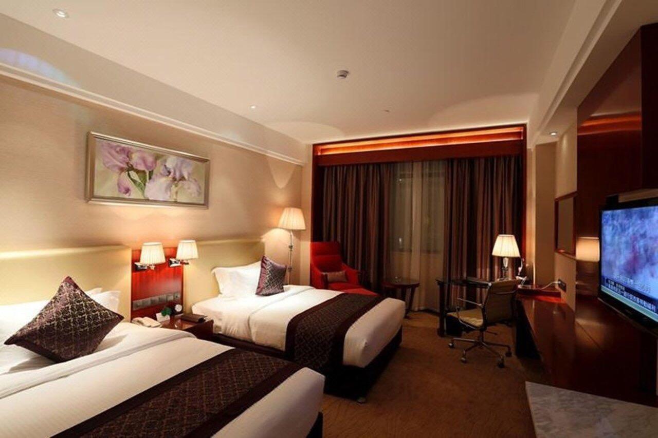 Wuhan Tianchimel Hotel Buitenkant foto